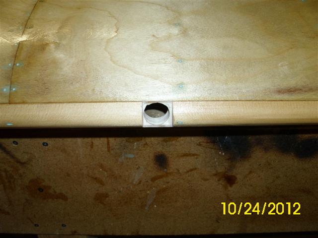 Leading edge cut with a small hobby saw, filed square then bored with a 7/8&quot; forstner bit.
