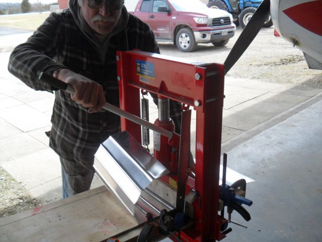 I am feeding from my left and indexing the previous corrugation in 2nd groove. I found that when I held the sheet in the 2nd groove that the spacing widened. I then tried using my left  hand on the feed side sheet when starting the press it worked perfectly. Creates scrap until you get it right.
